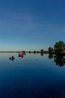Travel photography - calm sea with boats at dusk