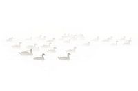 Grey geese in the morning haze