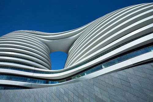 SOHO Galaxy office building against a blue sky