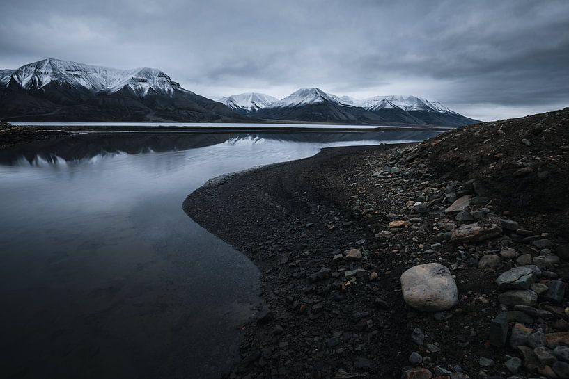 Fjord reflecting in the water by Martijn Smeets