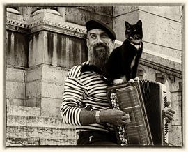Paris, portrait of an accordionist playing French chansons on the steps of Monmartre by ceesvanderjagtfoto