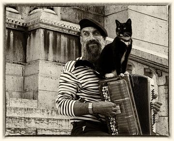 Paris, portrait of an accordionist playing French chansons on the steps of Monmartre by ceesvanderjagtfoto