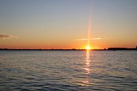 Zonsondergang aan het water