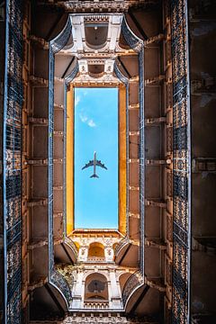 View upwards with airplane , Budapest courtyard by Fotos by Jan Wehnert