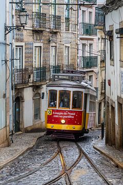 Tram 28 in old Alfama street by Sander Groenendijk