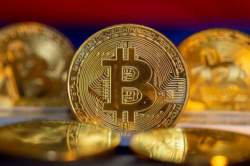 Close up of symbolic bitcoins