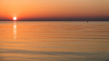 visser bij zonsopgang