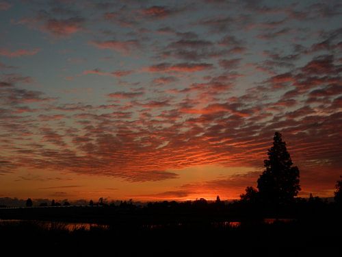 zonsondergang langs de Gouwe