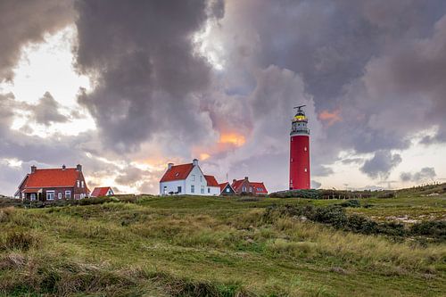 Atmospheric landscape with Texel lighthouse at sunset