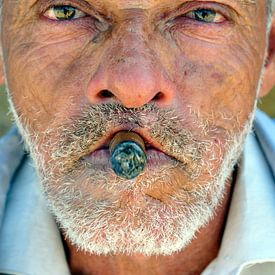 Man with Cohiba cigar on Cuba by Roelof Foppen