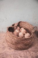 Wicker basket with coconuts