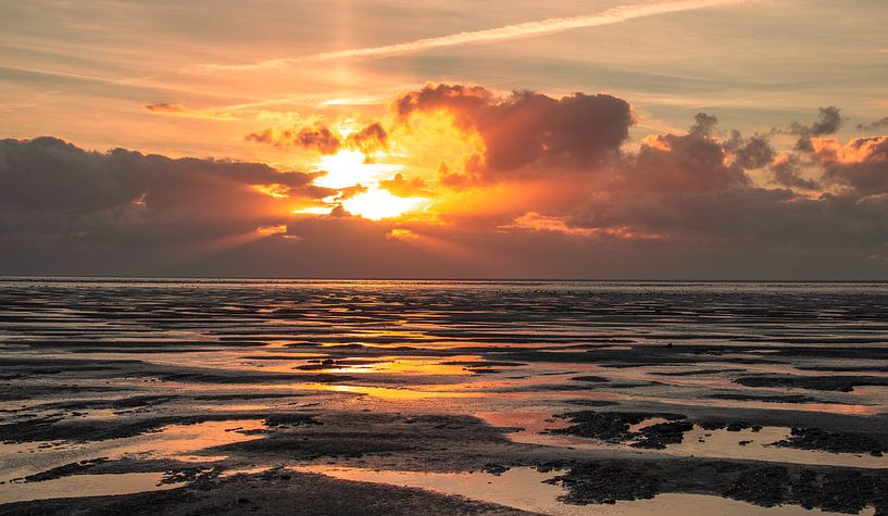 sunset on the mud flats by Lammie Postmus