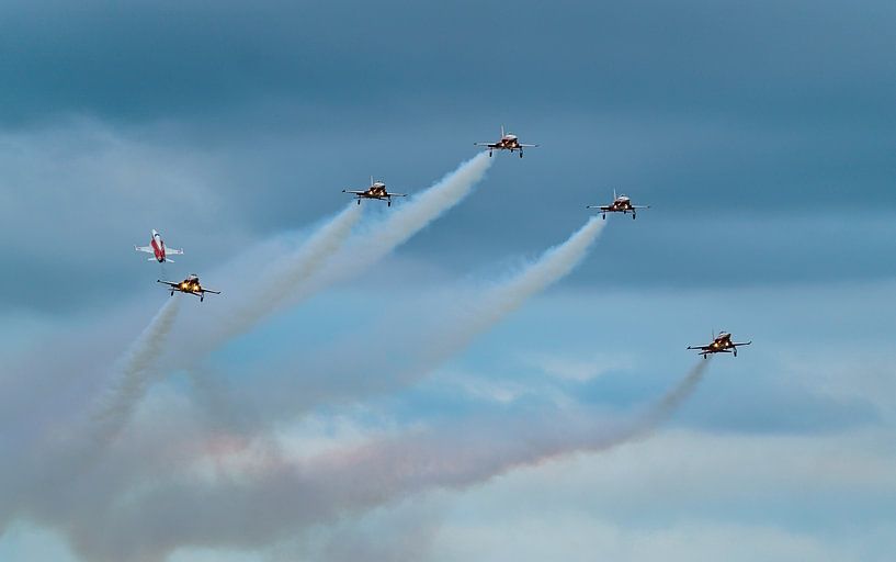 Patrouille de Suisse in action during airshow. by Jaap van den Berg