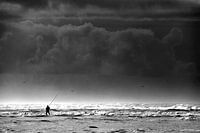 Fisherman in the surf of the North Sea