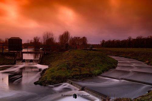 Zonsondergang bij vistrap het Woolde