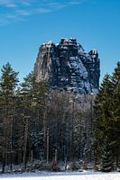 Winter landscape with sandstone rocks