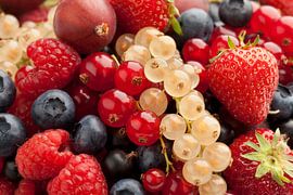 Composition of fresh ripe summer fruit close up by Frans Rombout