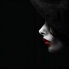 Subtle Passion | Woman with Red in Black by Karina Brouwer