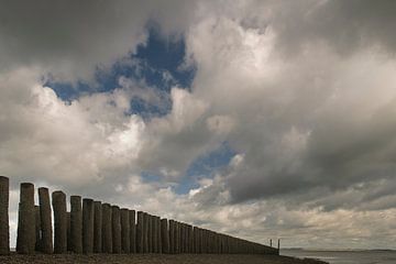 Groyne with clouds by Edwin van Amstel