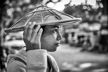 MANDALAY, MYANMAR, December 13, 2015 - Girl in Mandalay with traditional cap from Myanmar. by Wout Kok