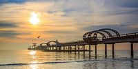 Morning sun over the pier