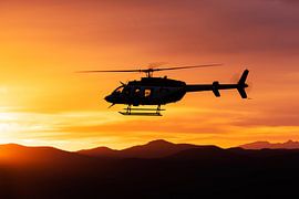 Guardian Air Bell 407GX during sunset over Sedona, AZ. by Jimmy van Drunen