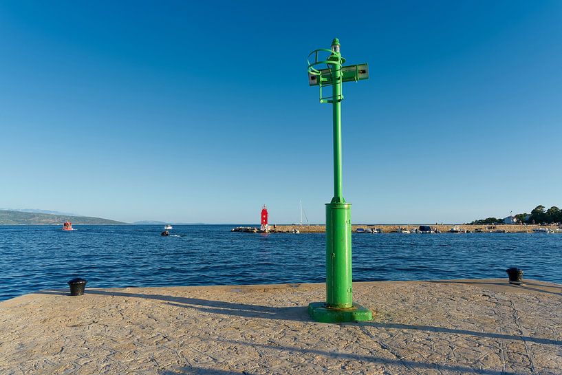 green lighthouse near Krk in Croatia by Heiko Kueverling