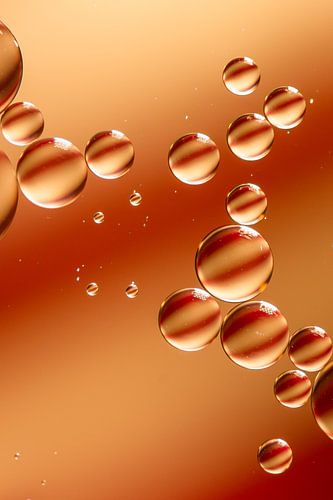 Druppels Olie op water