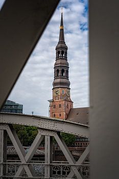 Historic Church Tower Through Bridge