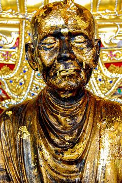Monk statue with gold leaf at Wat Saket Golden Mount in Bangkok Thailand by Dieter Walther