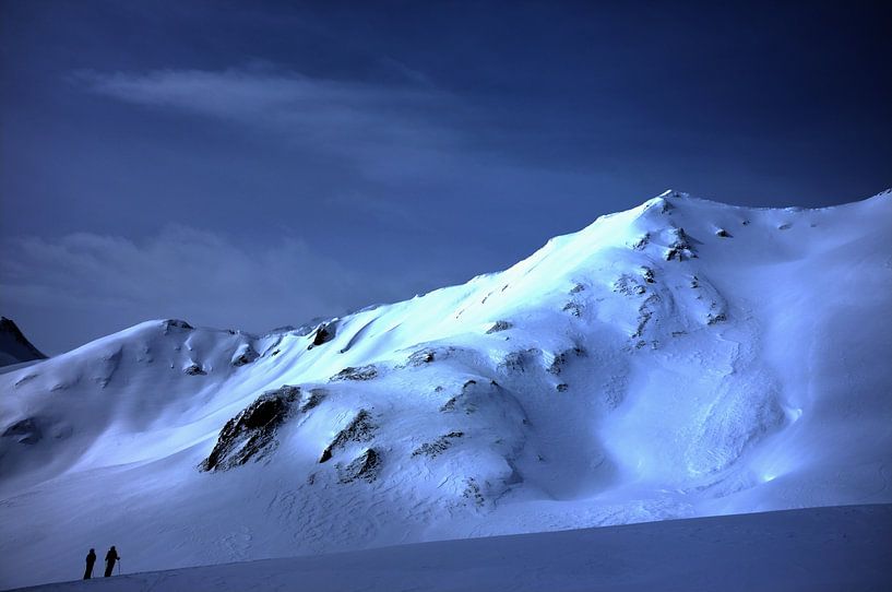 Skiers in front of the immensity of the landscape, French Alps by Luci Boreali
