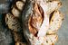 SF 12548801  Rustiek broodbord met brood op donkere achtergrond van BeeldigBeeld Food & Lifestyle