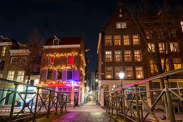 Paysage urbain d'Amsterdam la nuit aux Pays-Bas sur Eye on You