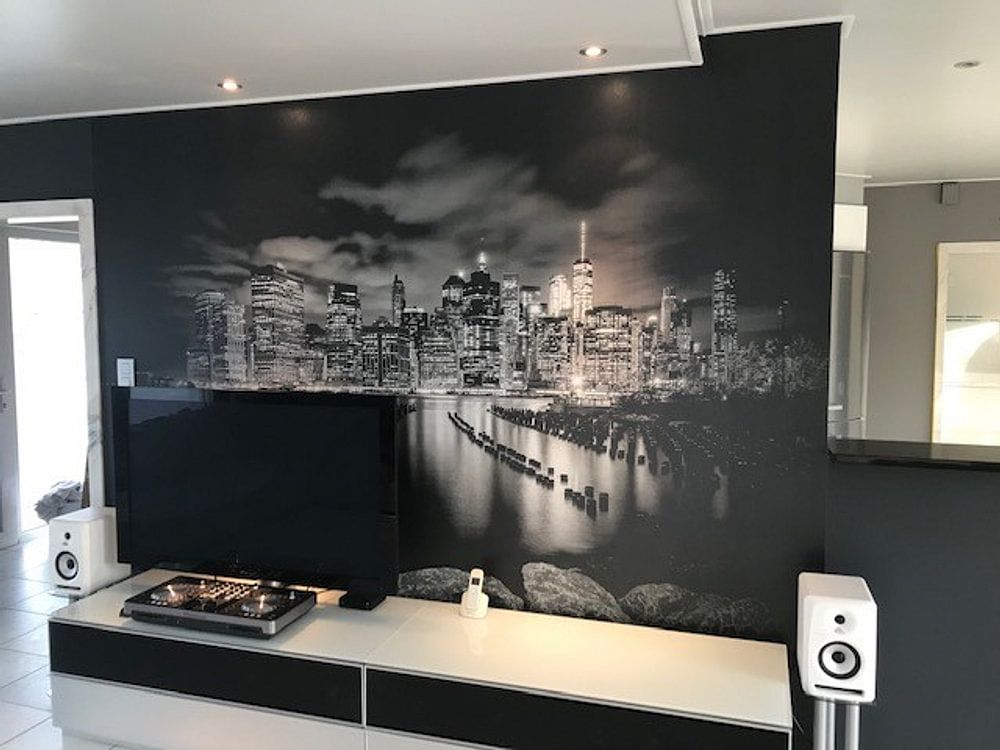 SKYLINE van MANHATTAN zonsondergang over de Stad New York | zwart-witt van Melanie Viola