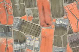 Facade of a house from old roof tiles by Heiko Kueverling