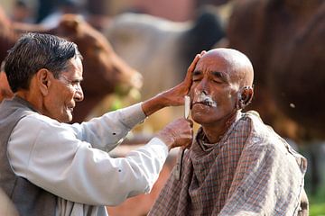 shaving in india by Paul Piebinga