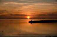 The sun sinks into the sea by Arjan Aarnoudse thumbnail