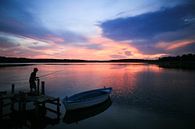 Fishing at sunset by Dennis Hens thumbnail