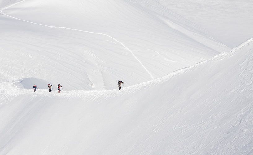Towards the Peak - climbing in the snow by Teun Ruijters