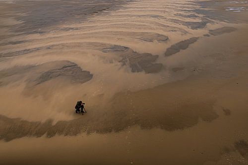 Fotograaf op het strand