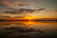 Water reflections at a beautiful sunset