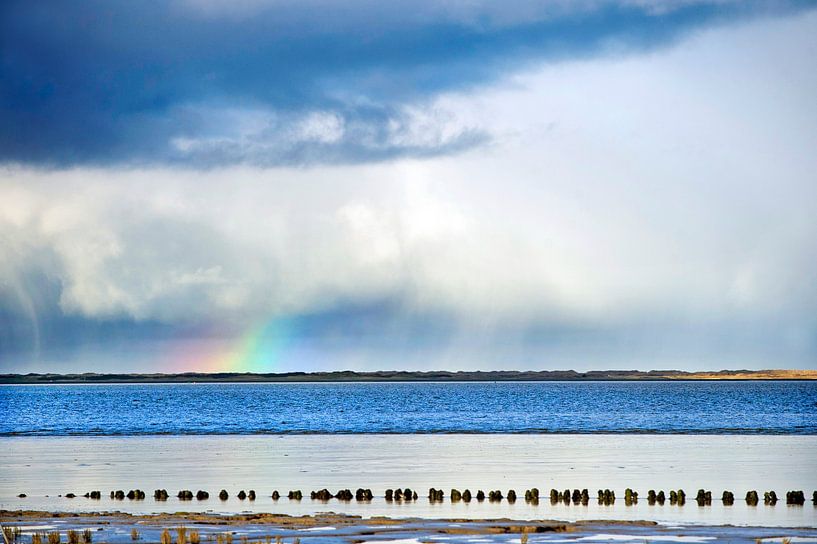 Clouds over Wadden Sea near Holwerd during low tide by Marcel van Kammen