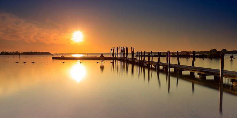 Scaffolding at the Wolderwijd just after a sunny sunrise by Marcel van den Bos