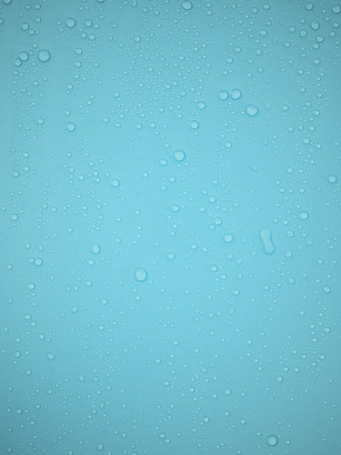 Water Droplets on a Turquoise Blue Surface