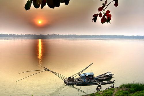 Schemering in Kratie: De elegantie van een Chinees visnet