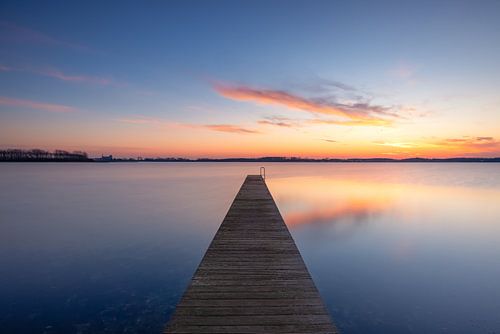Sunset at a jetty on Lake Veere, Zeeland