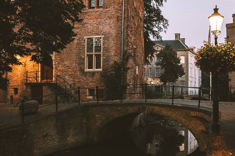 Bridge and old buildings in the Wall Houses of Amersfoort by Michiel Dros