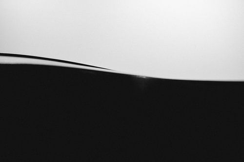 "Tender" in Schwarz und Weiß.