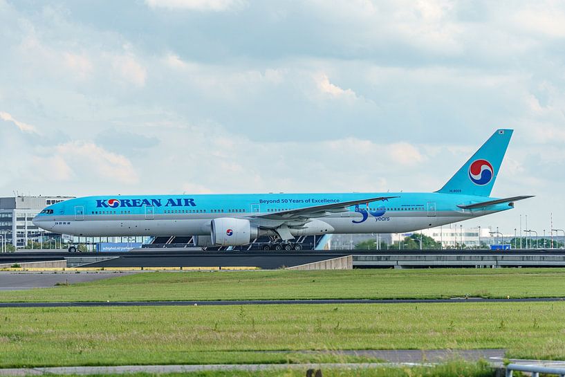Korean Air Boeing 777-300 with 50 years stickers. by Jaap van den Berg