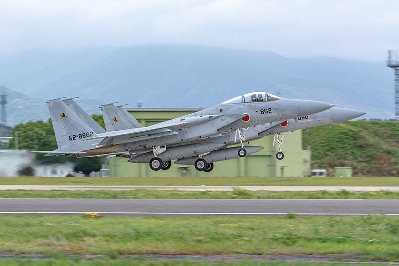 Take-off 2 Japanese McDonnell Douglas F-15 Eagles. by Jaap van den Berg